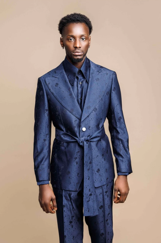 Feyi navy rose, paisley single-breasted suit with waist belt. Crafted in sheen poly wool, it features matching shirt and trousers with wide cuff and side adjusters.