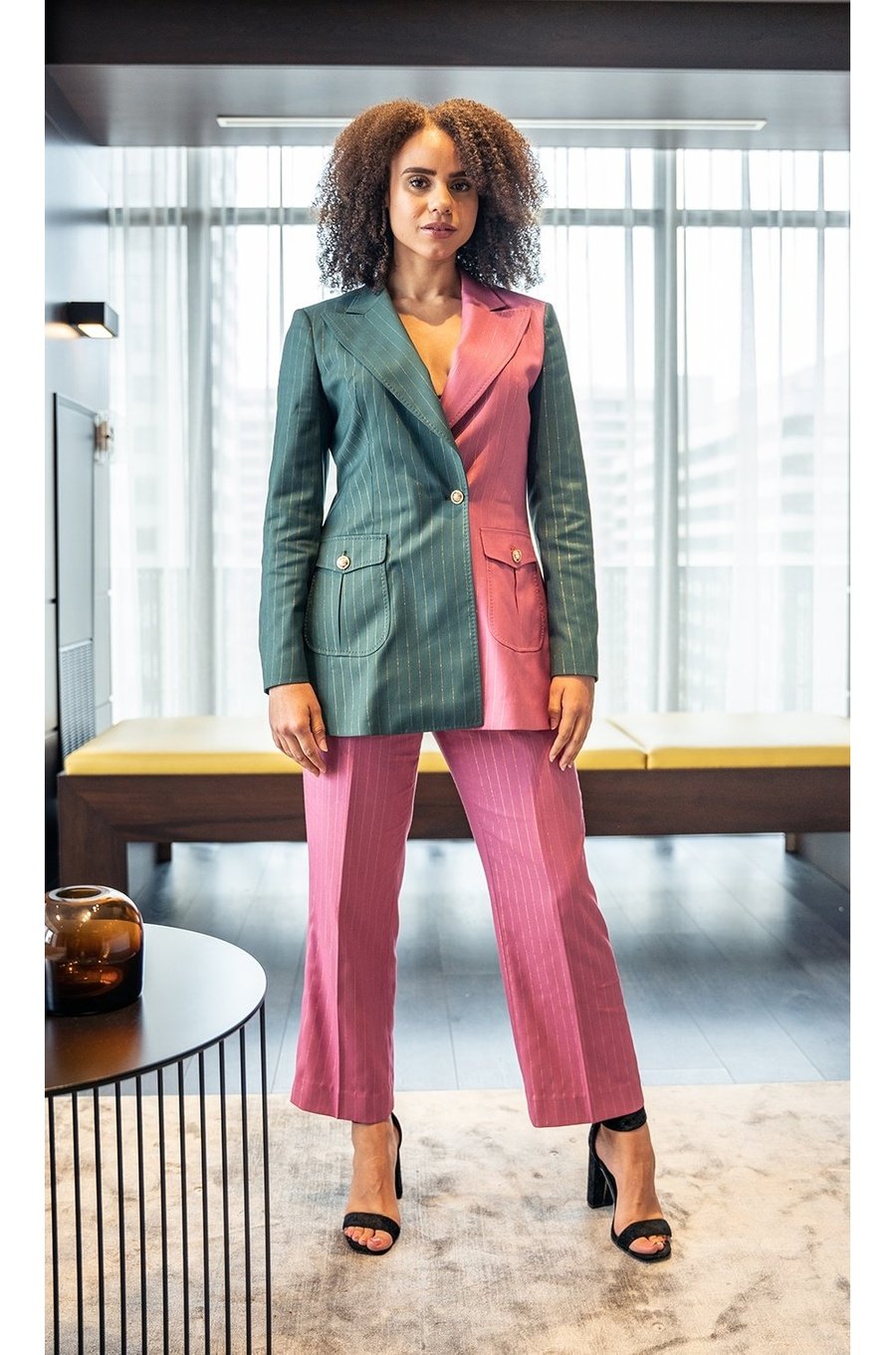 Nuna gold pinstripe, cross-phase double-breasted suit. 