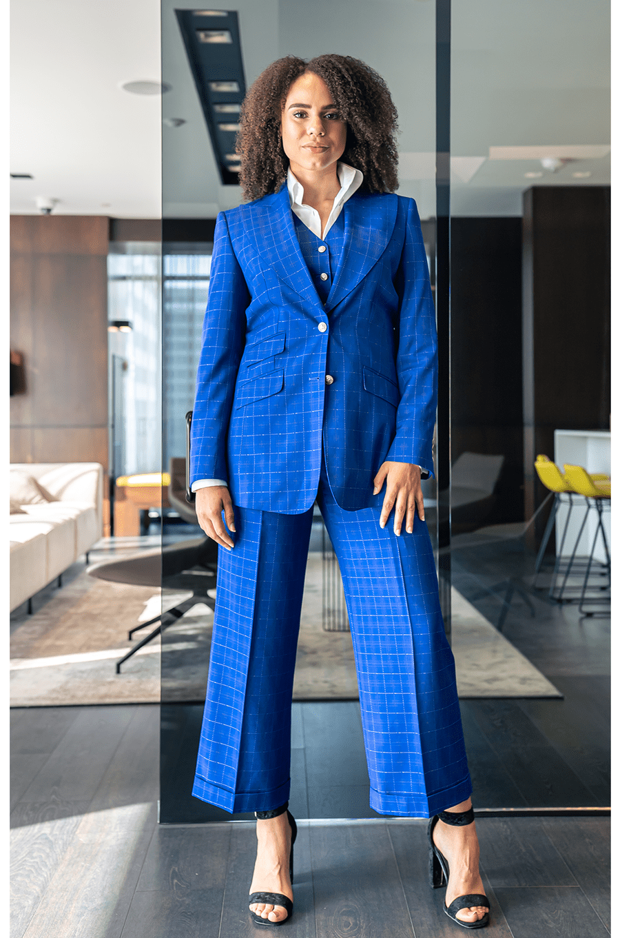 Yingor plaid sapphire blue, single-breasted suit. Crafted in soft poly-wool and decorated with crown aluminum buttons