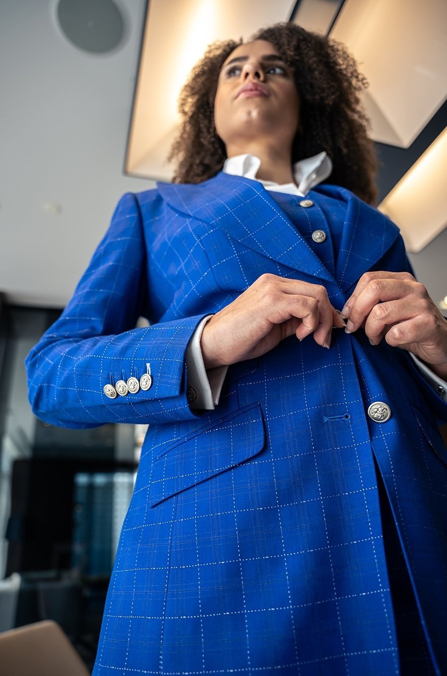 Yingor plaid sapphire blue, single-breasted suit. Crafted in soft poly-wool and decorated with crown aluminum buttons